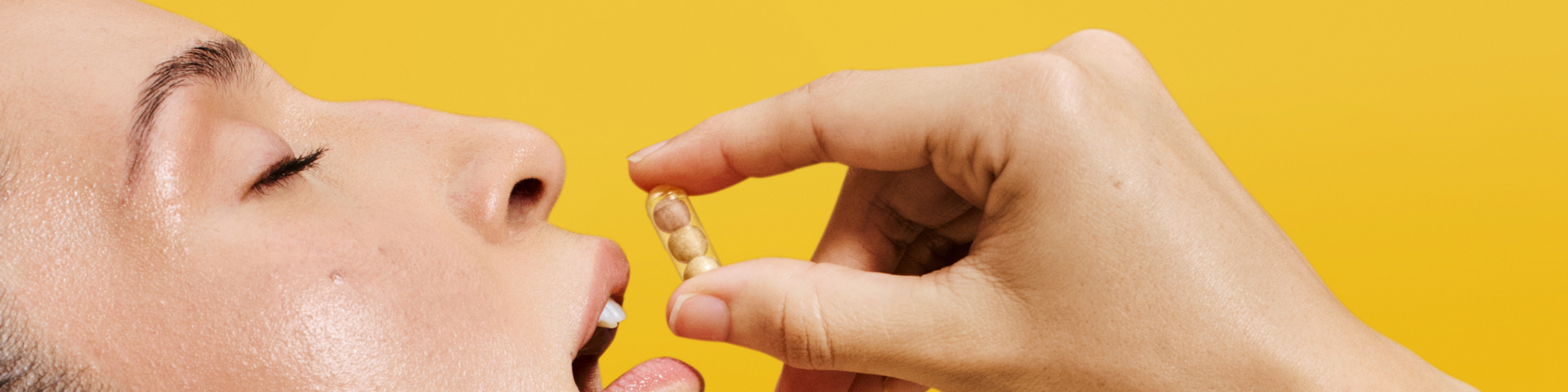 Woman finding relief with Ritual's Stress Relief Supplement.